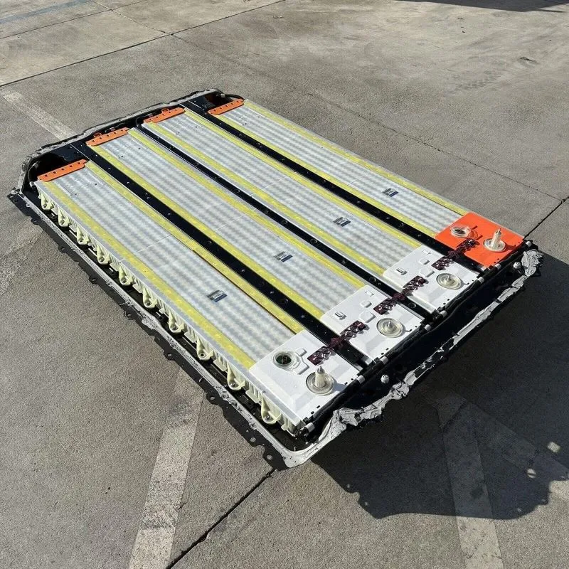 Image: Le Caterpillar 994A et la batterie Tesla